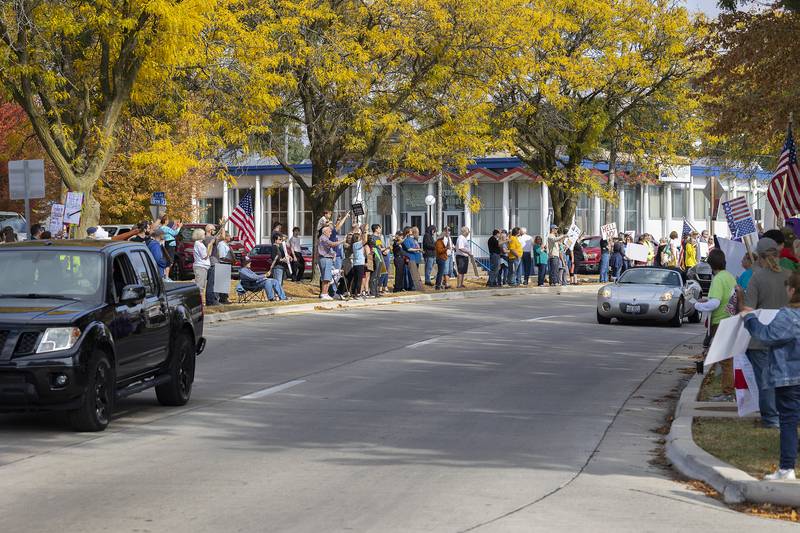 Protestors line Fourth Street in Sterling on Saturday, Oct. 18, 2025, for a “No Kings” rally against President Trump.