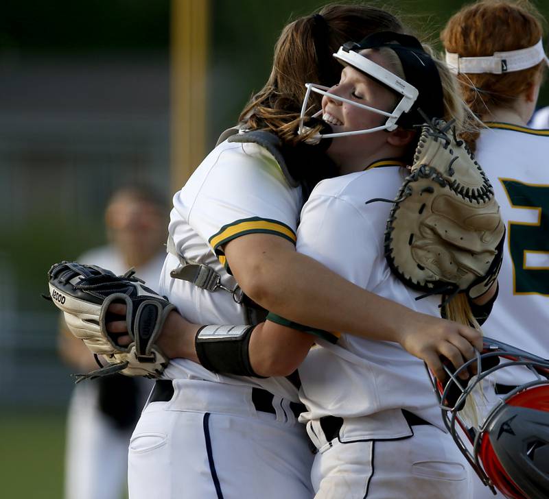 Crystal Lake South's Dana Skorich hugs Crystal Lake South's Kennedy Grippo after they defeated Burlington Central during a Fox Valley Conference softball game Monday, May 16, 2022, at Crystal Lake South High School.