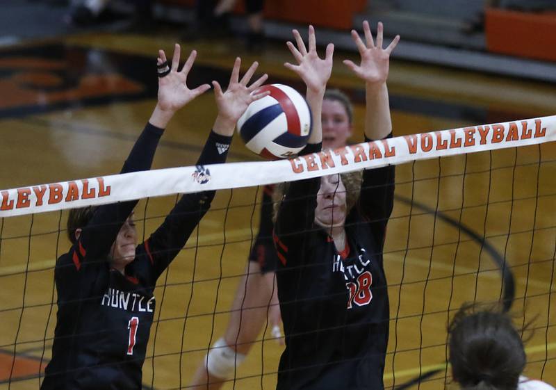 Huntley’s Maggie Duyos, left, Huntley’s Emily Willis trie to block the ball during a Fox Valley Conference volleyball match Tuesday, Aug. 23, 2022, between Crystal Lake Central and Huntley at Crystal Lake Central High School.