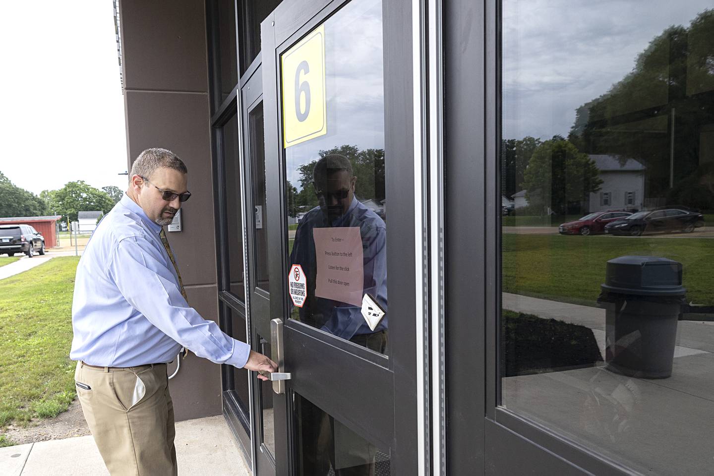 Amboy Superintendent Joshua Nichols enters the junior high Thursday, Aug. 1, 2024. The junior and high schools are implementing a mentoring program to help students most  at risk.