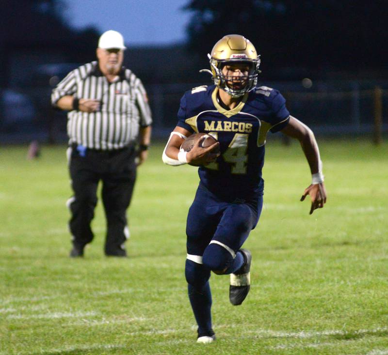 Polo's  Jordan Reed (14) heads to the endzone against Bushnell-Prairie City on Friday, Aug, 29, 2025 in Polo.