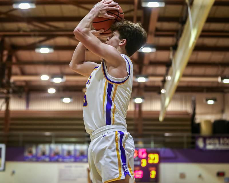 Downers Grove North's Owen Thulin (5) shoots a jump shot during basketball game between Downers Grove South at Downers Grove North. Dec 16, 2023.