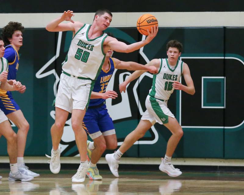 York's Hunter Stepanich (50) grabs a rebound during their basketball game between Lyons at York. Jan 10, 2025 in Elmhurst.