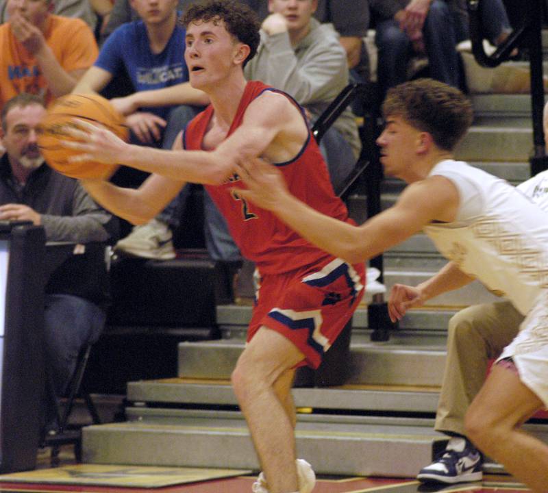 Eastland's Wyatt Carroll throws the ball to a teammate. The Eastland Cougars faced the Pecatonica Indians in Friday’s Class 1A Orion Sectional final at Orion High School on March 6, 2026. Eastland won the game 48-41.