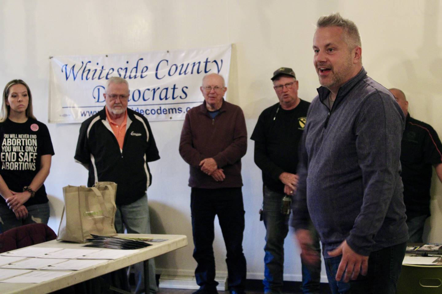 Eric Sorensen, Democratic candidate for the 17th District U.S. House seat, addresses supporters before they begin door-to-door canvassing on Saturday at the Whiteside County Democratic headquarters in Rock Falls.