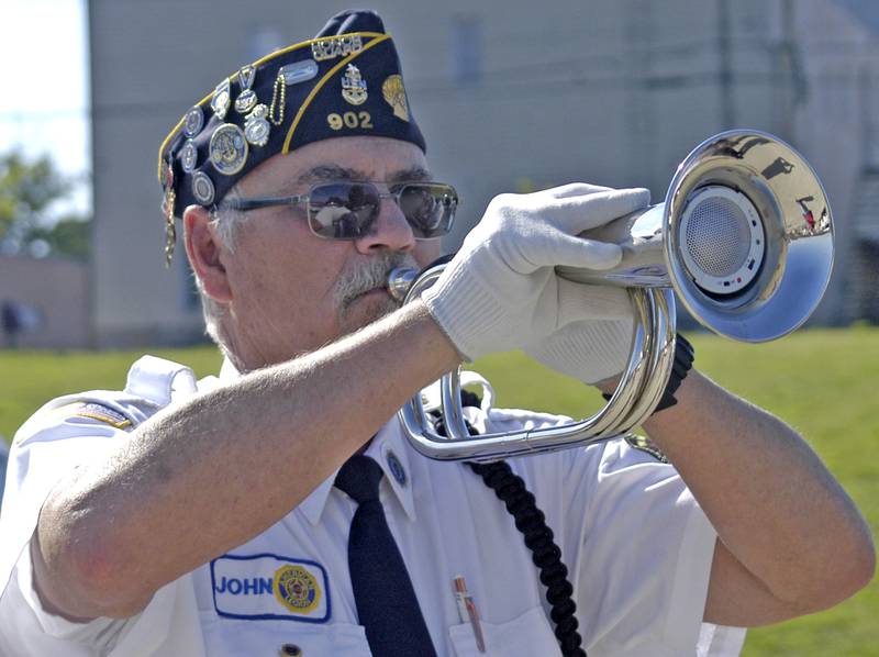 RF Legion Commander John Roush plays taps at the lower dam in Rock Falls. Twin City American Legions marked Memorial Day with various events on Monday, May 25th, 2026. Events included a Rifle Volley, playing of Taps, a Memorial Day Service and an American Flag mural dedication.