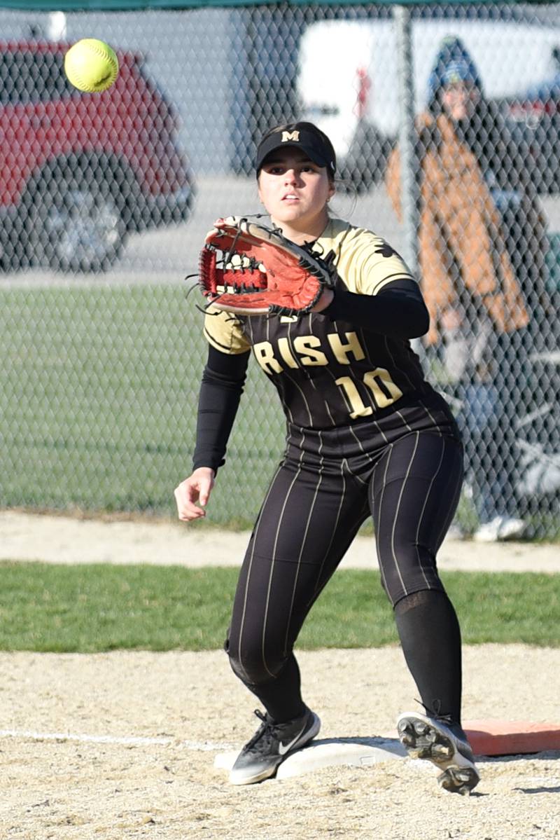 Bishop McNamara's Rhaya DePaolo fields a throw at first base during a home game against Aurora Christian Tuesday, April 8, 2025.