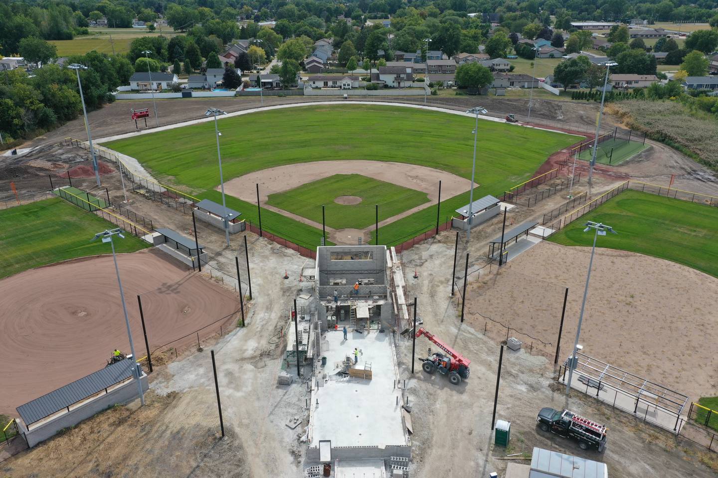 An aerial view of workers building a new press box at the La Salle-Peru Township High School Athletic Complex on Tuesday, Sept. 5, 2023 in La Salle.