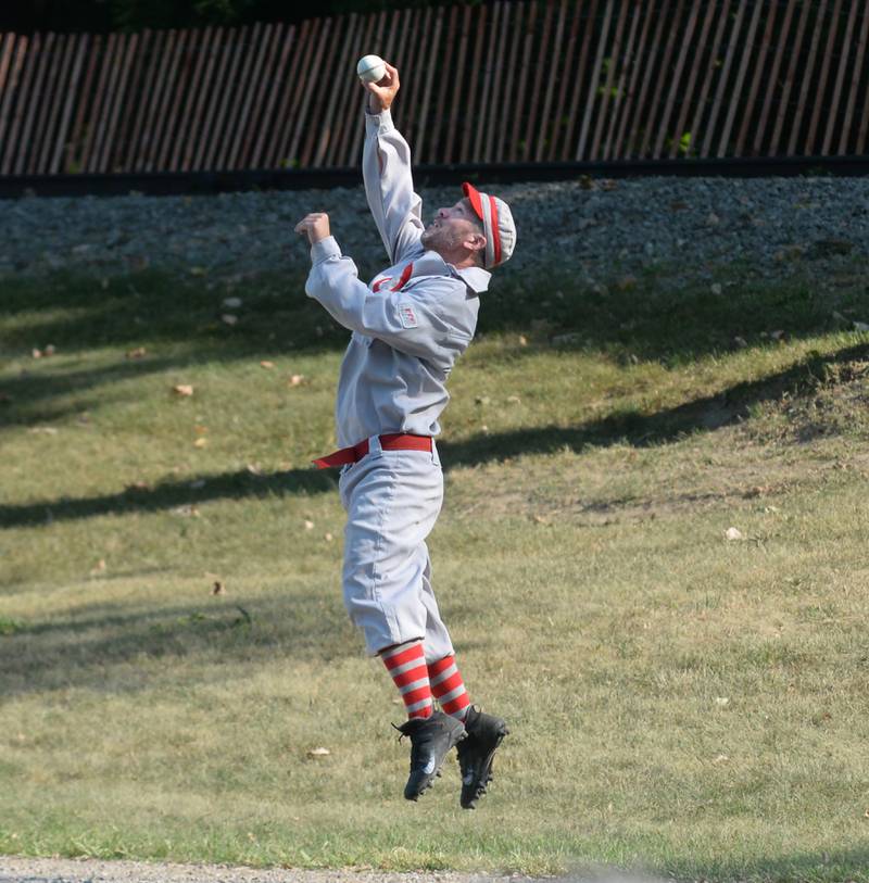 Oregon Ganymede Eric Berg snatches a fly ball against Columbus during the team's first game at the World Tournament of Historic Base Ball held at the Henry Ford Museum's Greenfield Village on Saturday, Aug. 9, 2025.