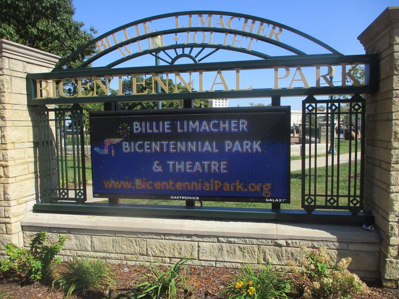 A monument sign for Billie Limacher Bicentennial Park is posted at the park entrance at 201 W. Jefferson St. in Joliet.
