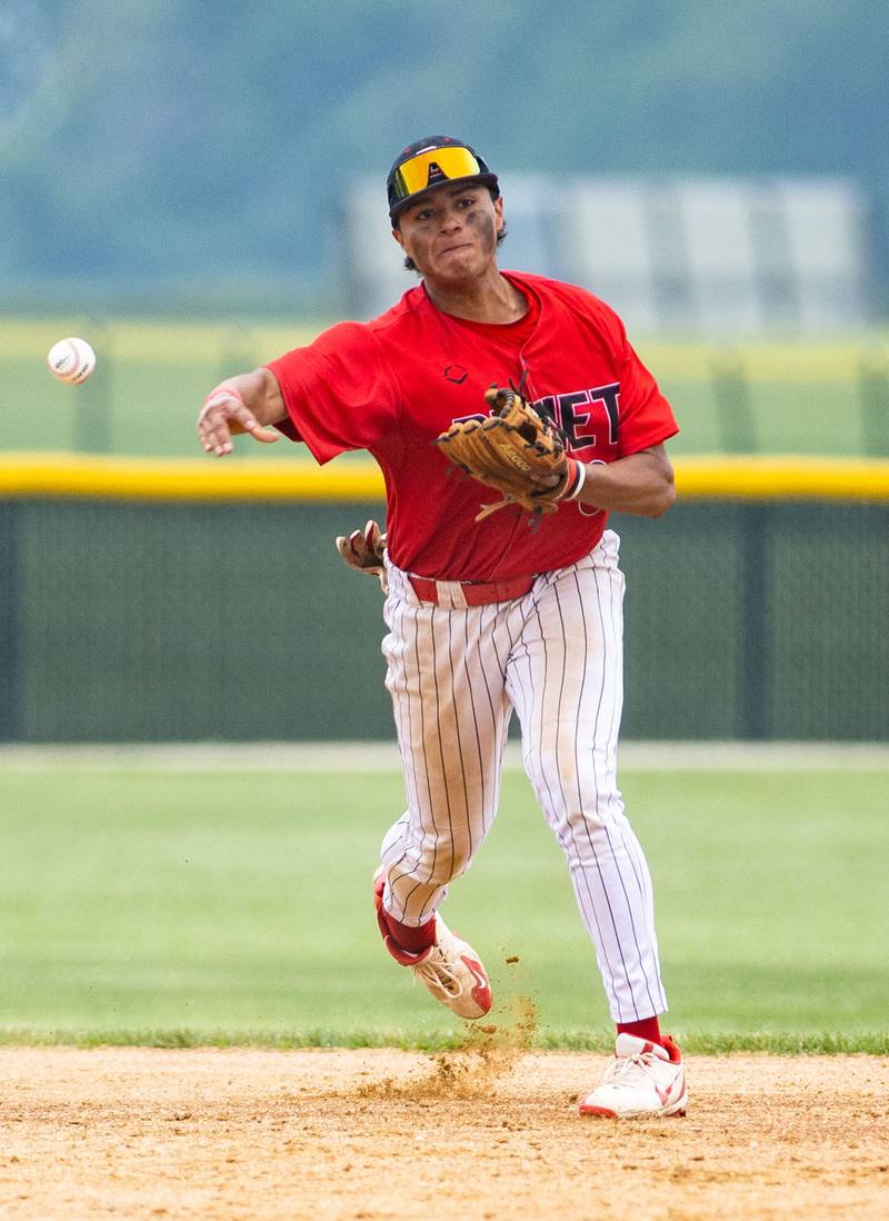 Benet Academy’s Ethan Mendez throws to first for about during the School Class 3A Kaneland Sectional final against St. Francis High School at Kaneland High School in Maple Park on Saturday, June 7, 2025.