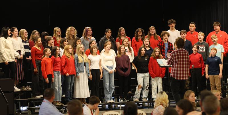 Members of the Parkside Middle School 7th and 8th grade choir perform "America Heros, an Armed Forces Salute" during the Veterans Day program on Tuesday, Nov. 11, 2025 in Peru.