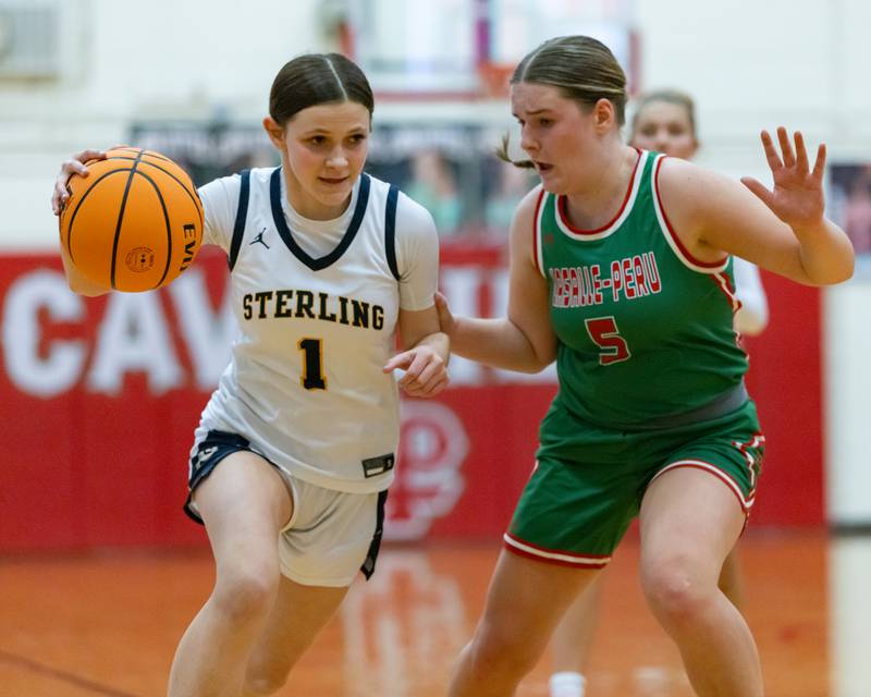 Alivia Gibson of Sterling drives the ball down court against LP's Emma Jareb during the IHSA Class 3A Girls Basketball Regionals in Sellett Gym on February 6, 2026 at LaSalle-Peru High School.