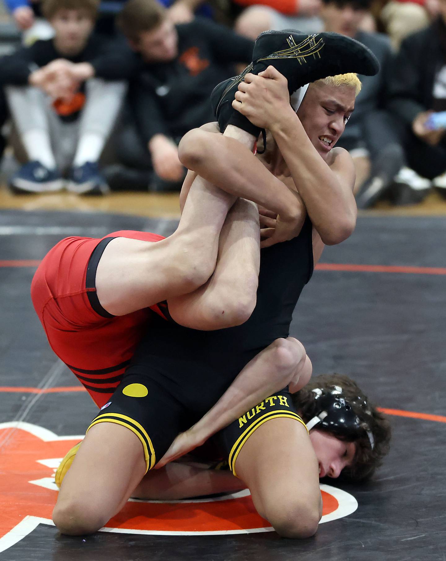 Batavia’s Ino Garcia wrestles Glenbard North’s Kalani Kiev at 120-pounds during the DuKane Conference Meet Saturday, Jan. 20, 2024 in St. Charles.