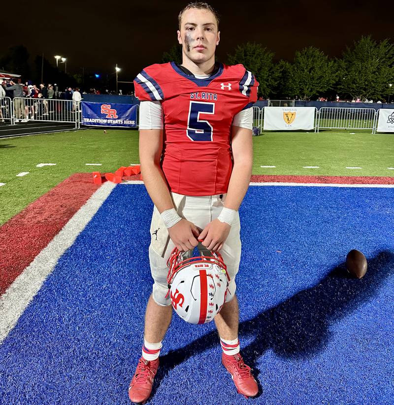 St. Rita quarterback Steven Armbruster threw for 153 yards and two touchdowns during Friday's Chicago Catholic League football win over Marist.
