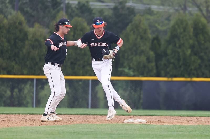 Lincoln-Way West’s Lucas Acevedo steps on second to end the inning with runners in score position against Lincoln-Way Central on Monday, May 8, 2023 in New Lenox.