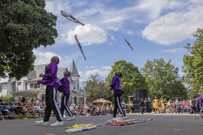 Members of the South Shore Drill Team from Chicago perform in front of the Mendota Elks lodge after the parade on August 11, 2024.