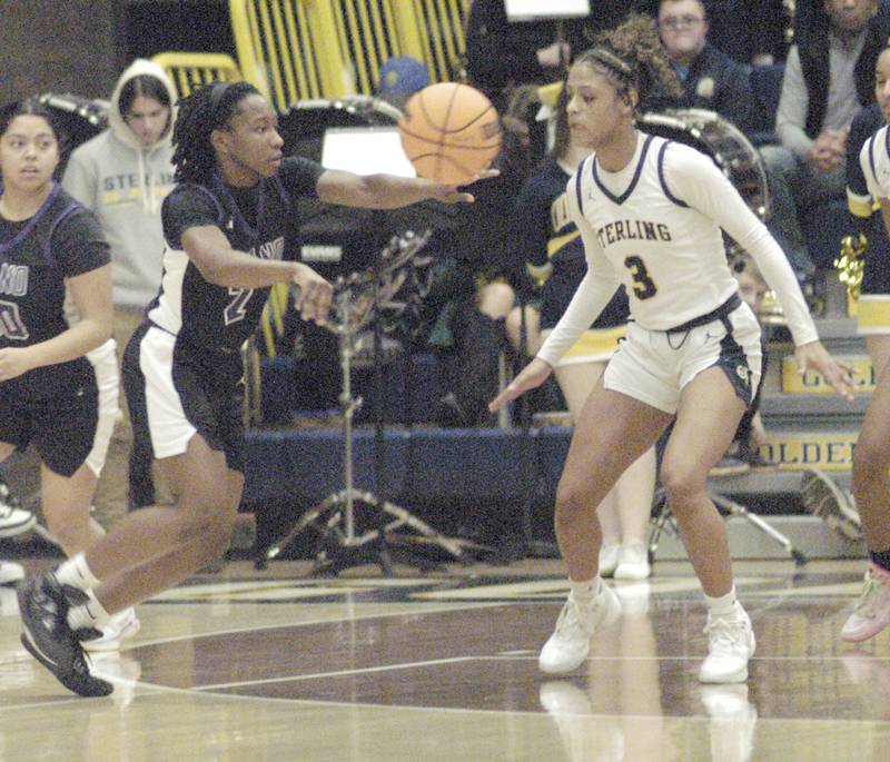 Plano's Sanai Young passes to a teammate. The Sterling Golden Warriors faced off against Plano Lady Reapers in an IHSA 3A Regional girls final at Musgrove Fieldhouse in Sterling on February 20, 2025. Sterling won the game 70-38.