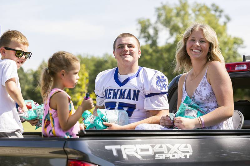Newman High School homecoming king Cooper Spears and queen Grace Tobias ride through the parade Friday, Sept. 12, 2025.
