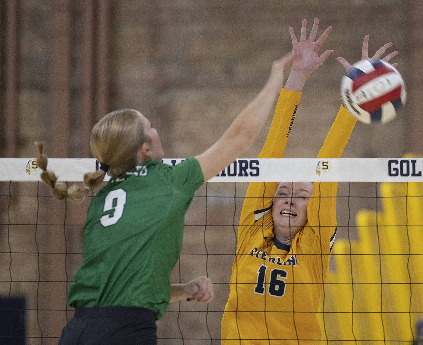 Sterling’s Kasey Weeks goes up for a block against Geneseo’s Elli Barickman Tuesday, Sept. 30, 2025.