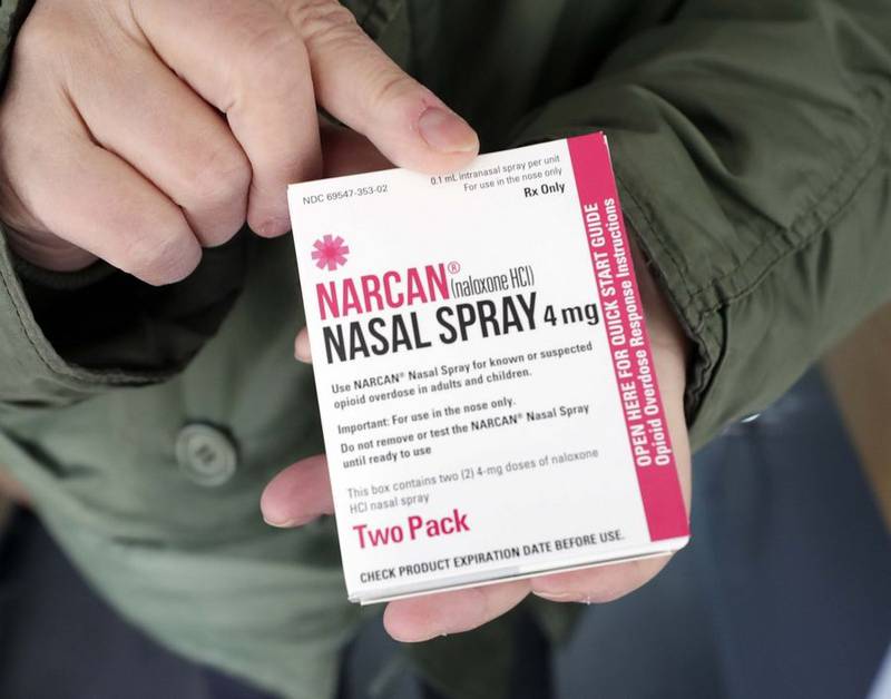 Live4Lali Executive Director Laura Fry holds a box with Narcan, the brand name for naloxone, in the organization's mobile outreach van Thursday, March 10, 2022.