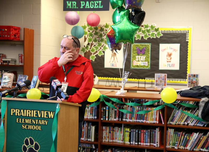 Prairieview Elementary School Principal Mark Pagel reacts to his surprise announcement as Illinois Principals Association Principal of the Year at the Downers Grove school on Wednesday, March 9, 2022. Prairieview is part of Center Cass School District 66.