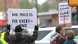 Oregon May Day rally protest: Attendees display signs against Trump policies