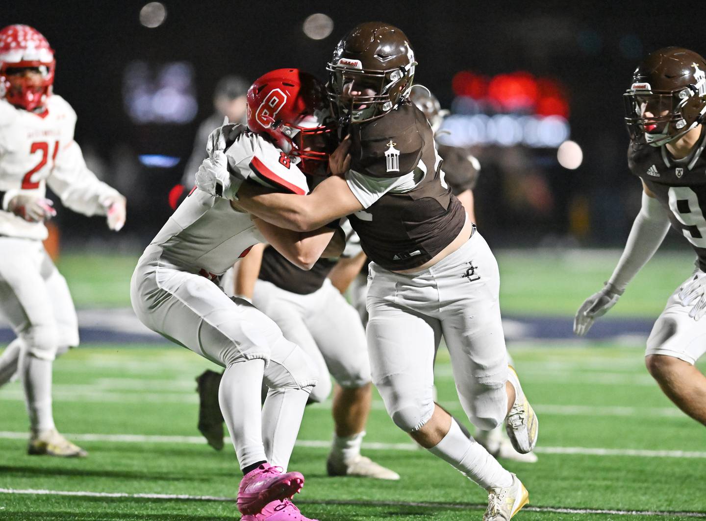 Joliet Catholic's Ian Campbell (99) wraps up Jacksonville's Braden Hutchison (8) for a loss during the IHSA Class 5A first round playoff game on Saturday, Nov 02, 2024 at Joliet. (Dean Reid for Shaw Local News)