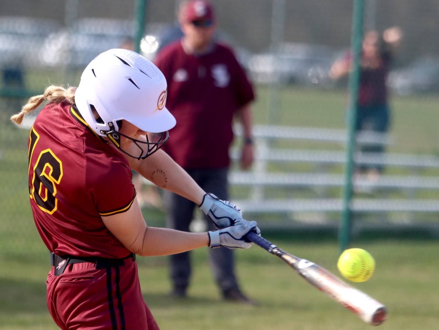 Richmond-Burton’s Taylor Davison makes contact in varsity softball at Marengo Tuesday.