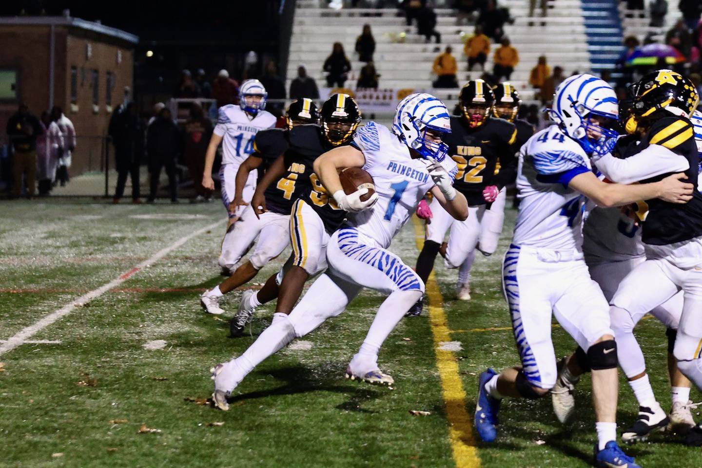 Princeton's Casey Etheridge goes full steam ahead for a run in Saturday's game in Chicago. He scored four touchdowns in the Tigers' 34-16 win over Chicago King.