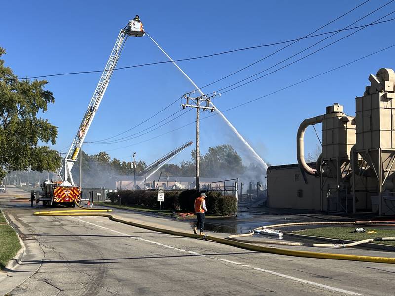 Firefighters responding to a fire on Thursday, Oct. 17, 2024, at Tri-Star Cabinets and Top Company in New Lenox.