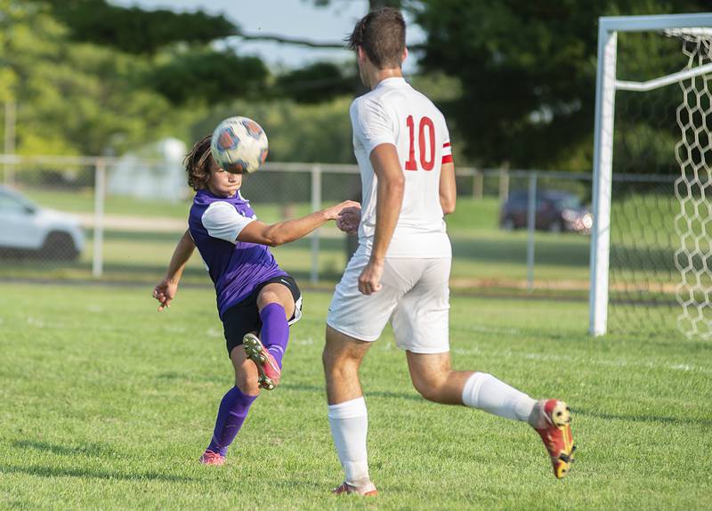 Dixon’s Walker Tilton boots the ball out of trouble against Oregon on Wednesday, Sept. 14, 2022.