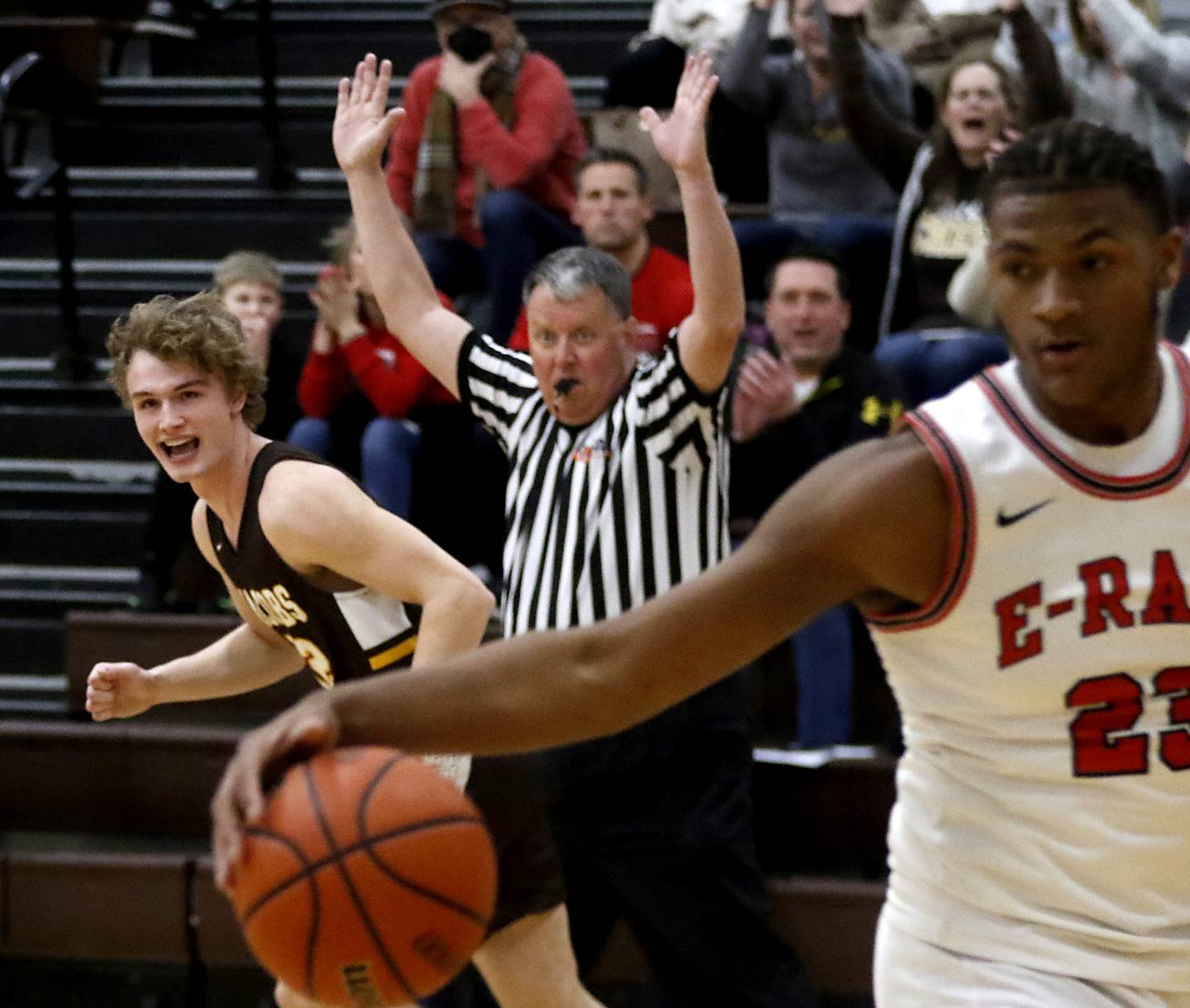 Jacobs’ Jackson Martucci celebrates a three-pointer during a IHSA Class 4A Boys Regional basketball game Wednesday, Feb. 23, 2022, between Rockford East and Jacobs at Jacobs High School.