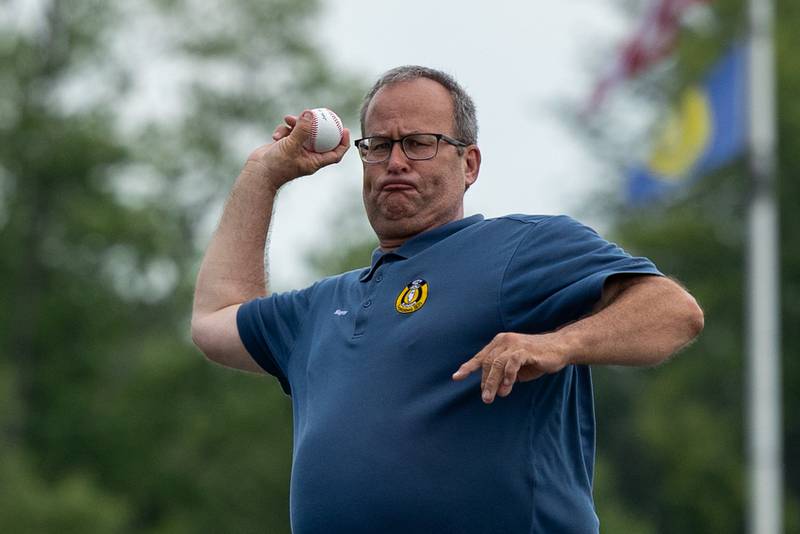Peru Mayor, Ken Kolowski throws first pitch at the Central Region Tournament, opening Ceremony on Friday, July 11, 2025 at Washington Park in Peru.