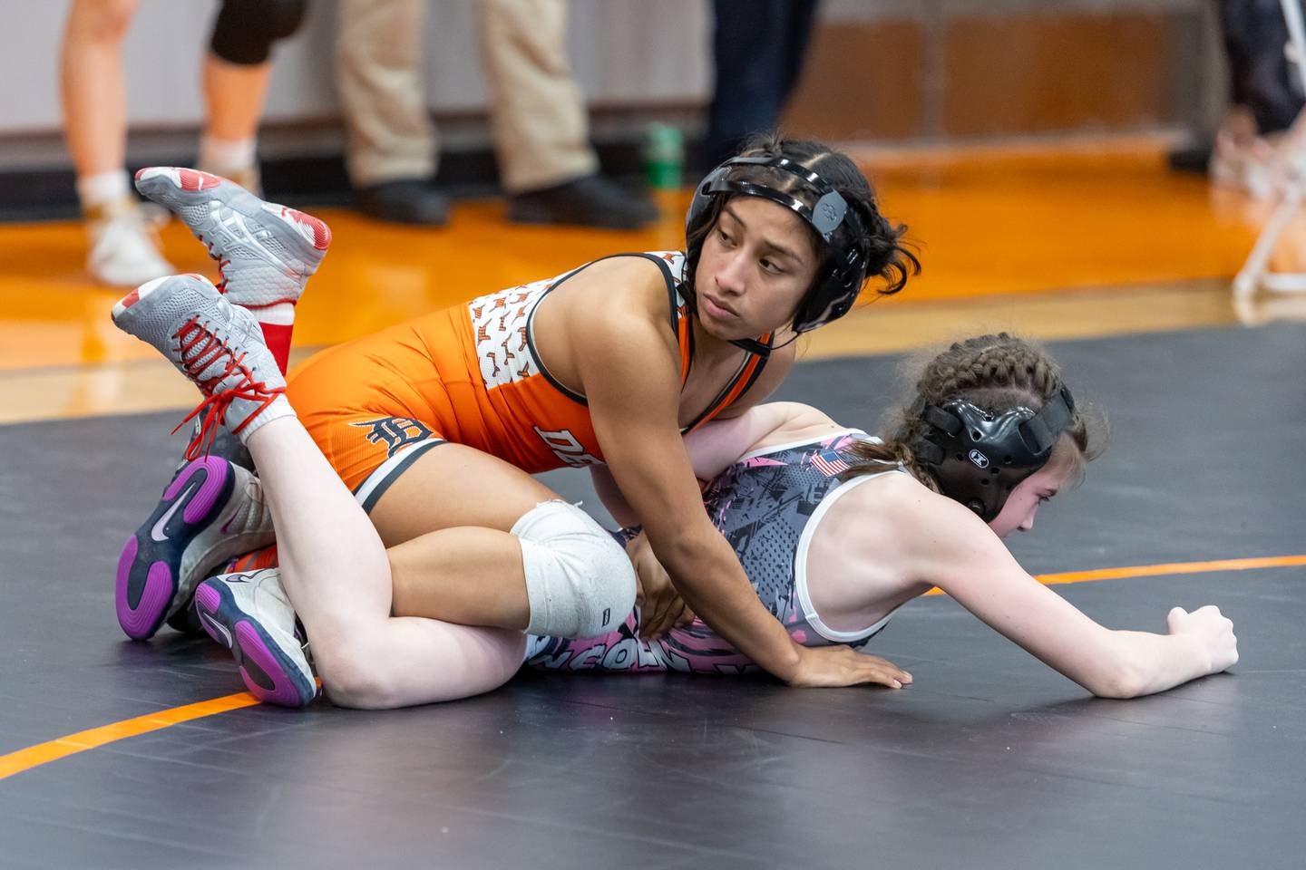 DeKalb’s Alex Gregorio-Perez and Lincoln-Way’s McKenzie Steinke compete in the 100 lb finals during the Minooka Girls Wrestling Thanksgiving Throwdown competition at Minooka High School on Nov. 26, 2026.