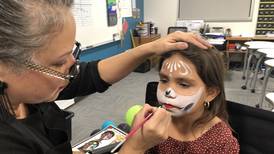 McHenry High School students honor deceased loved ones at Día de los Muertos celebration