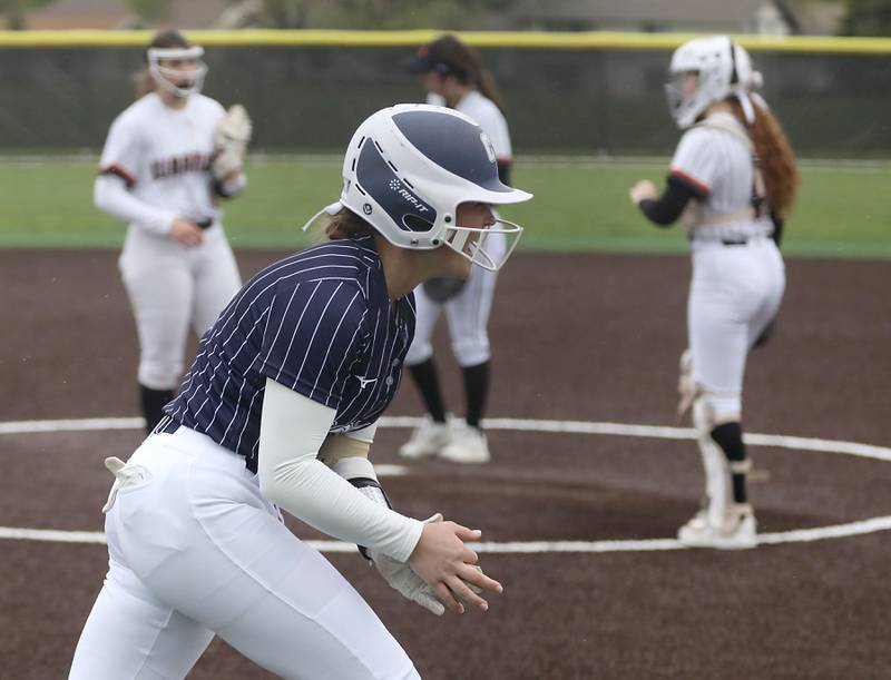 Cary-Grove's Paityn Ahlquist celebrates her home run during a Fox Valley Conference softball game against McHenry on Thursday, April 30, 2026, at McHenry High School.
