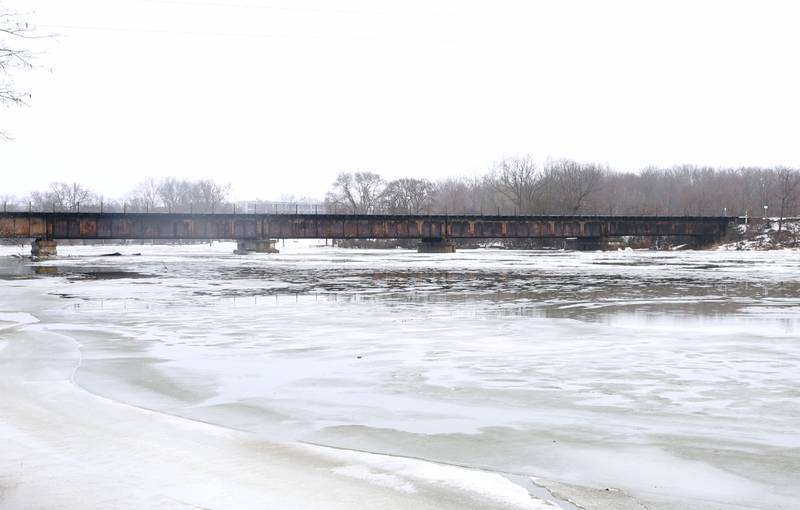 The Fox River rises to it's banks near the Fox River Aqueduct on Friday, Jan. 26, 2024, in Ottawa.