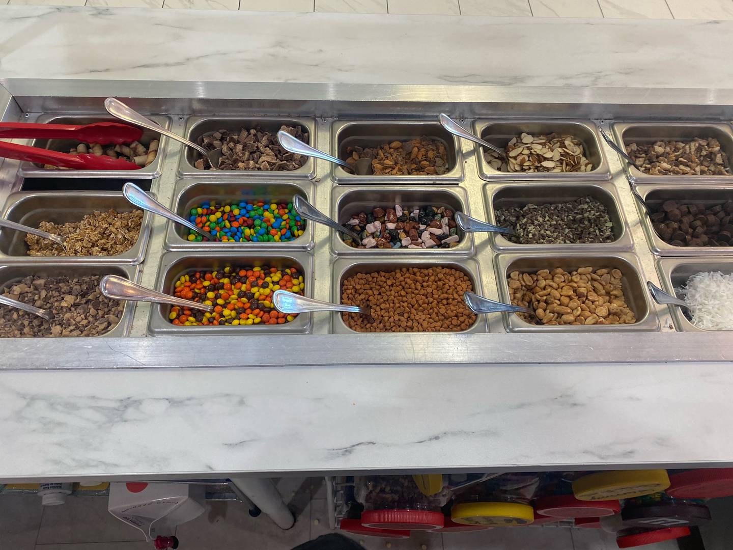 Fill-A-Cup offers over 70 toppings, including fresh fruit, candies, and more.
