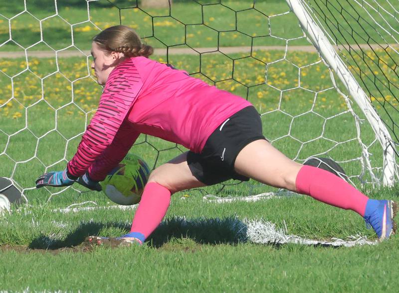 Streator's Jordan Hatzer hits a corner kick on Thursday, April 16, 2026 at the James Street Recreational Complex in Streator.