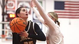 Olivia Schuster shows off post moves as Jacobs rolls past Dundee-Crown