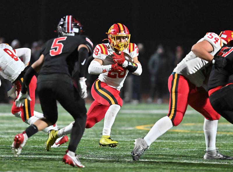 Batavia's Nathan Whitwell (28) looks for a opening during the Class 7A semifinal playoff game against Lincoln-Way Central on Saturday, Nov 23, 2024 at New Lenox. (Dean Reid for Shaw Local News)