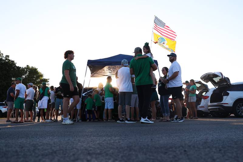 Providence fans tailgate before the game against rival Joliet Catholic on Friday, Sept. 1, 2023  at Joliet Memorial Stadium.