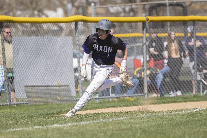 Dixon’s Quade Richards rounds third base against Newman Saturday, April 13, 2024 at Veterans Memorial Park in Dixon.