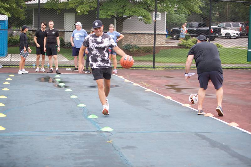 Participants taking part in The Amazing Race Hardy Strong at Mt. St. Mary Park in St. Charles on Saturday, August 5, 2023