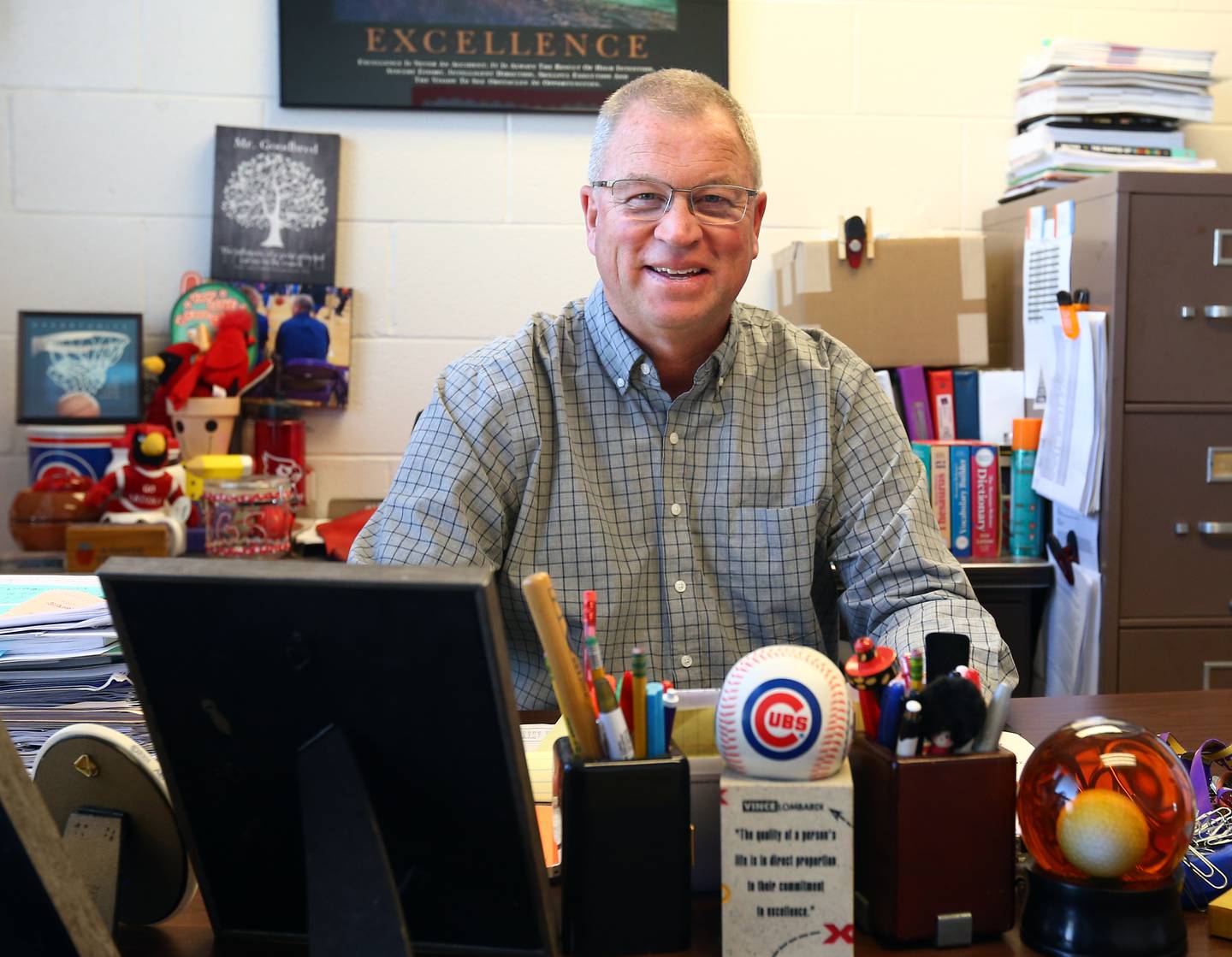 Randy Goodbred, principal at Sheridan Grade School, poses at his desk on Tuesday, May 15, 2022, in Sheridan.