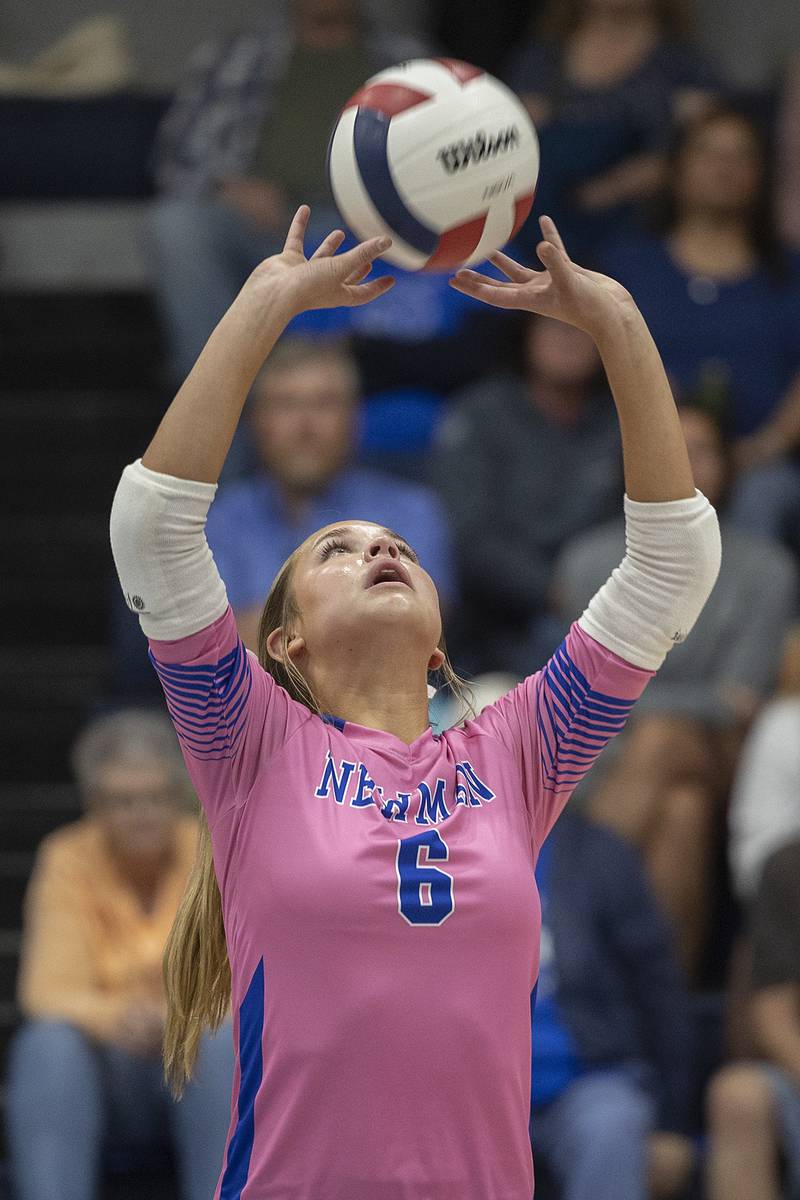 Newman’s Brooklyn Smith sets the ball against Erie-Prophetstown Tuesday, Oct. 14, 2025.