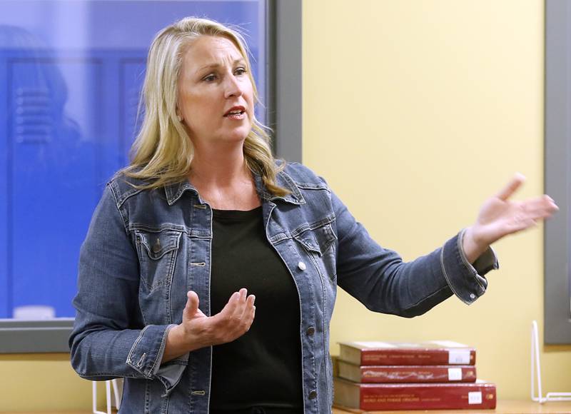 Johnsburg High School English teacher and learning-center director Meg Oeffling teaches an AP literature class Wednesday, April 19, 2023, at the school in Johnsburg.