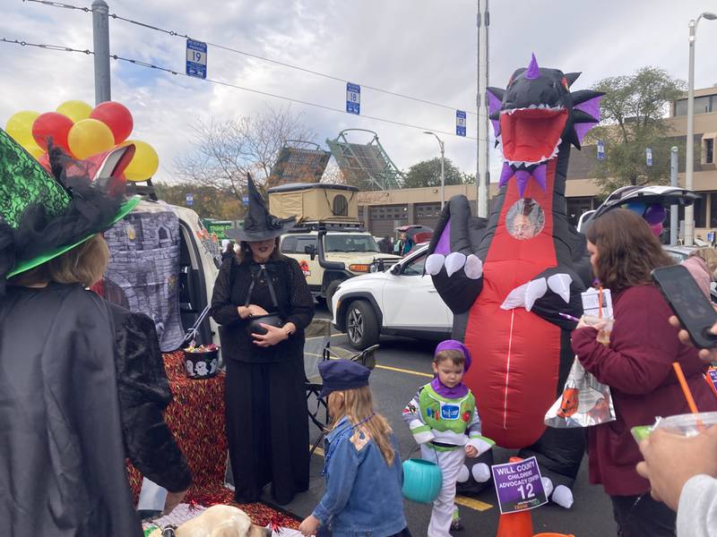 Trick-or-treaters play "the floor is made of lava" at the trunk of the Will County Children's Advocacy Center.
Saturday, Oct. 25, 2025.