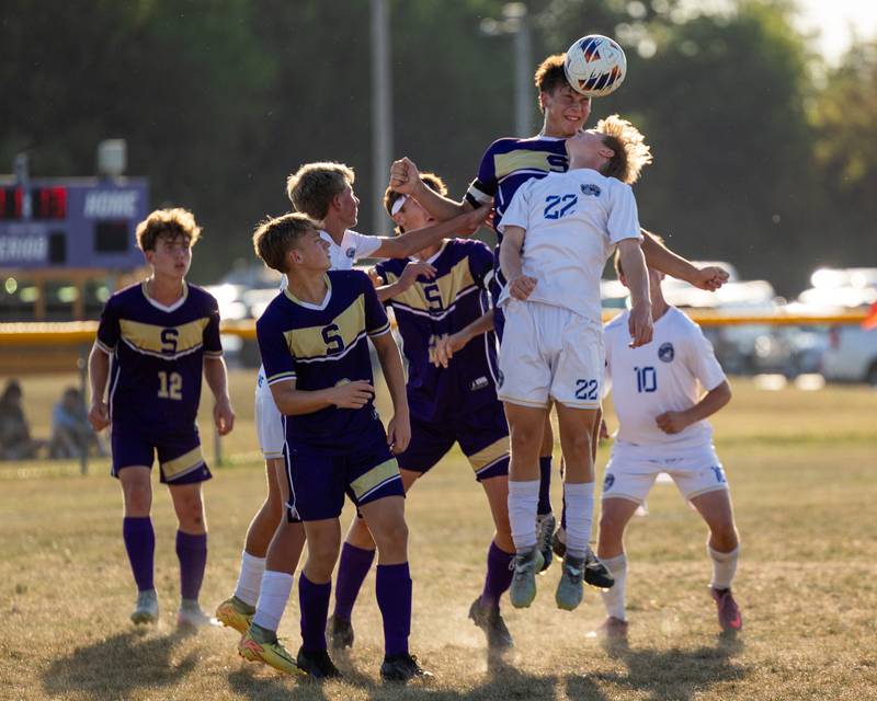 Payton Twait (23) of Serena and Brady Andrews (22) of Somonauk/Leland/Newark both attempt to header ball on Monday, Sept. 29, 2025, at Serena High School in Serena.